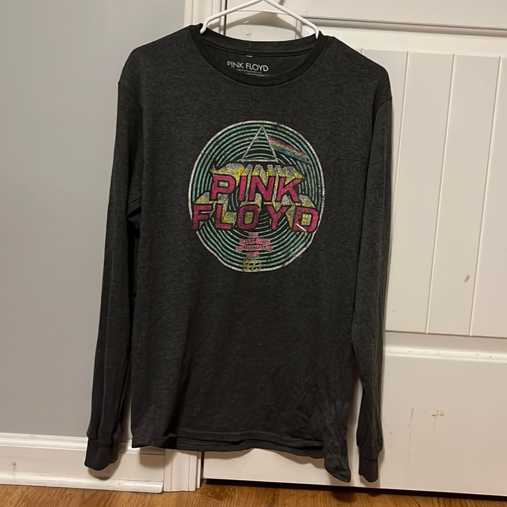 Great condition. Never been worn, size small, and with long sleeves